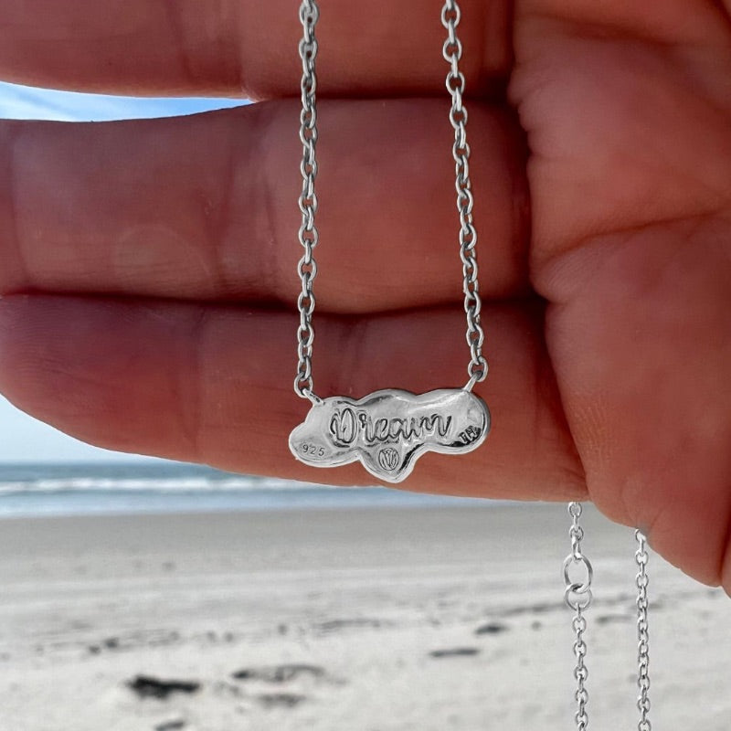 Affirmation word Dream engraved on back of the Cloud Necklace by Goddaughters