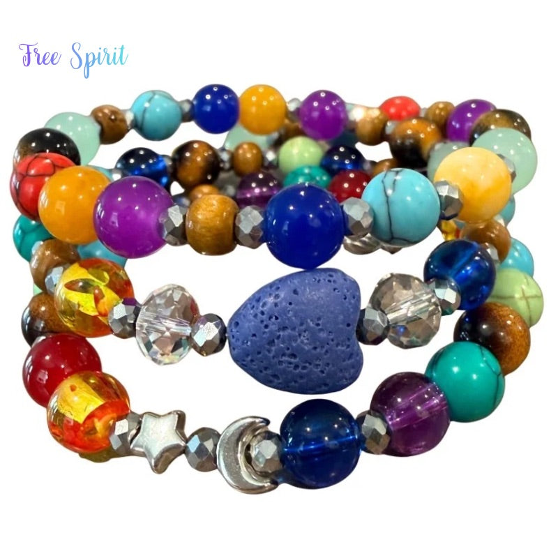 Colorful beaded bracelet with a blue stone on a white background, featuring the brand 'Free Spirit'.