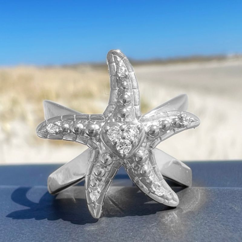 oddaughters Sterling Silver Starfish Ring a symbol of hope and resilience With white topaz gemstones heart