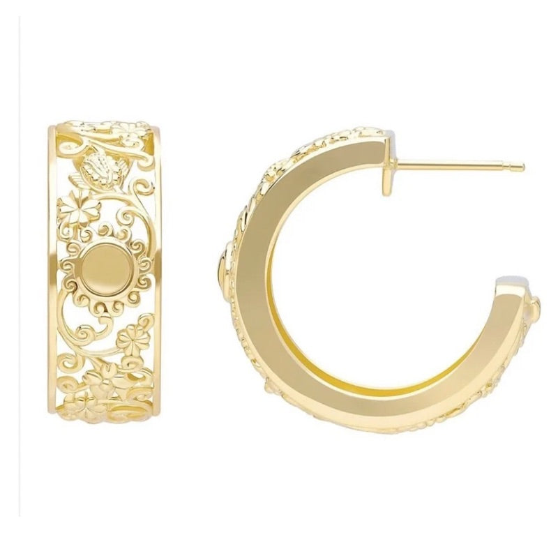 Earrings designed with symbols of empowerment by Goddaughters