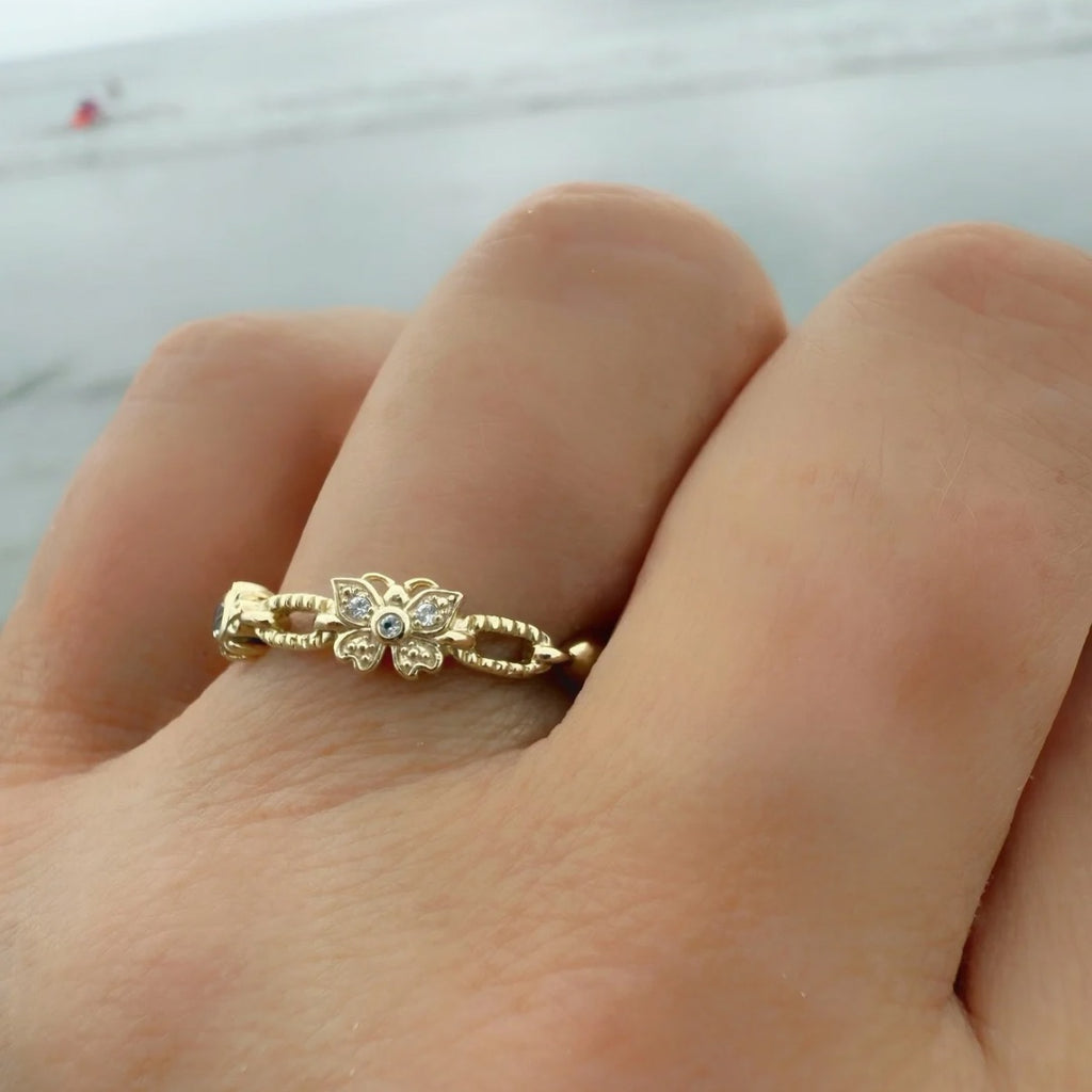 Good Vibes Ring Butterfly symbol with white topaz by Goddaughters