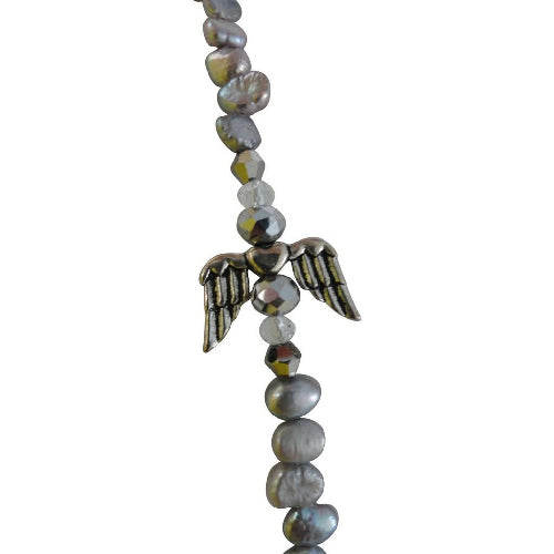 Sparkling Silver Angel necklace with silver wings that sit on your shoulder