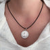 Zen Lion Medition Medallion on Cord Necklace by Goddaughters.JPG